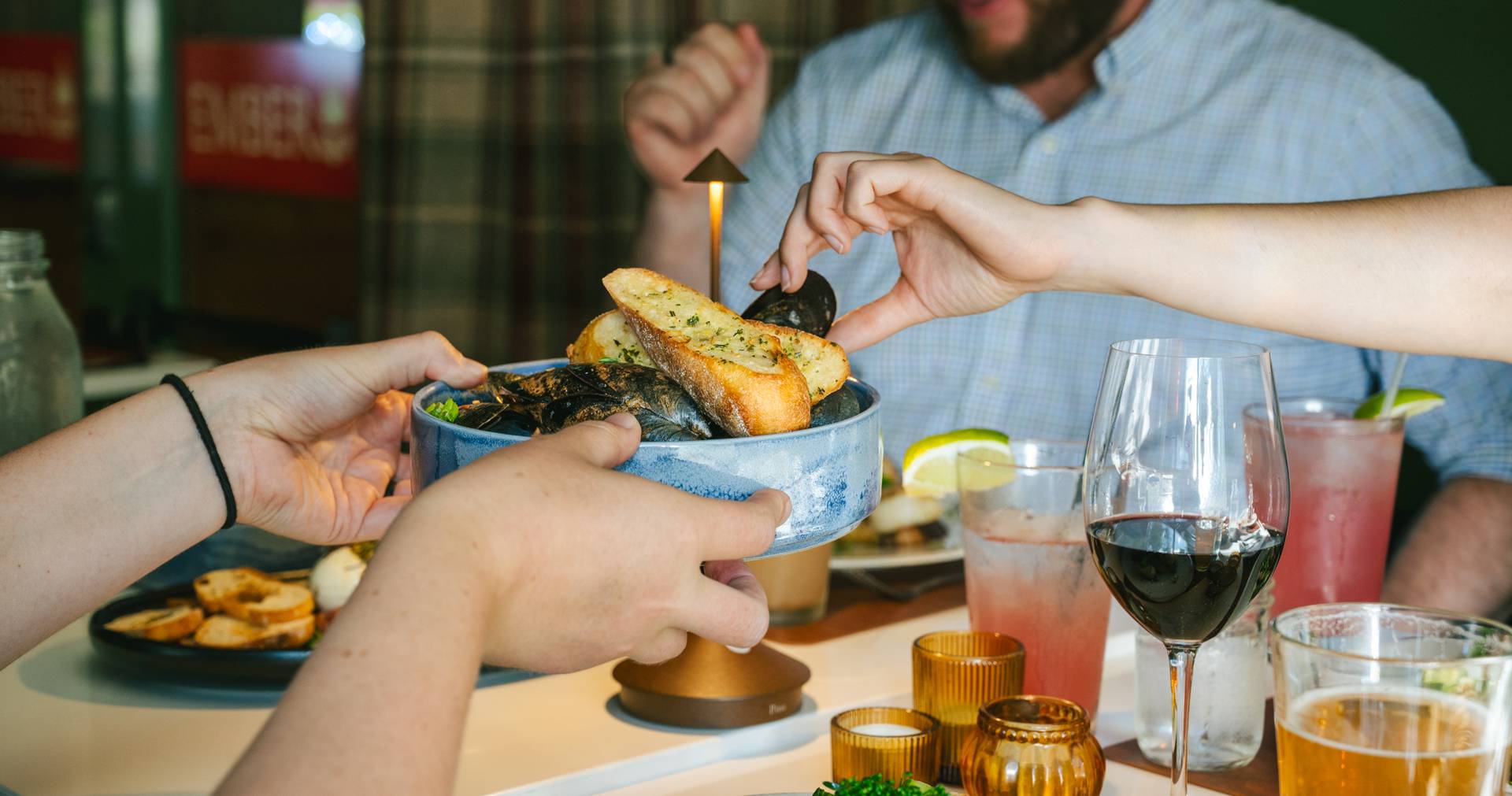 A person grabbing mussels at Sunday River.