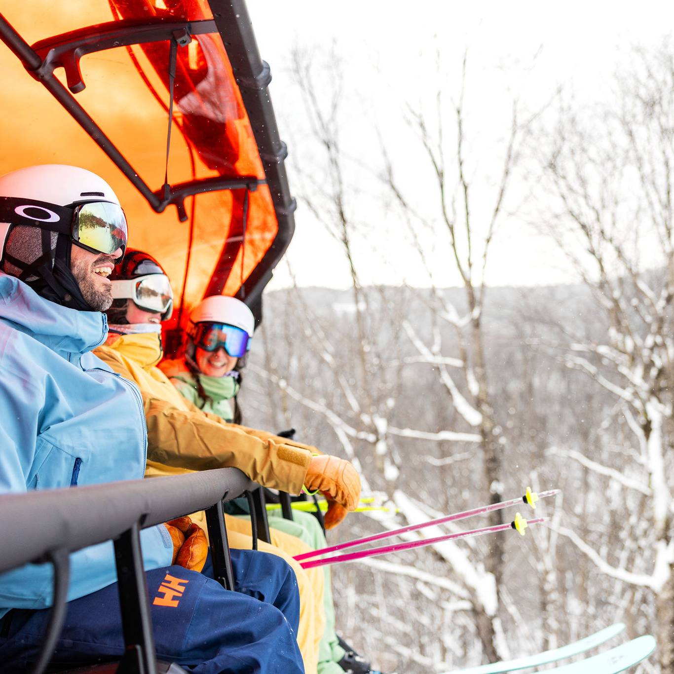 Friends sitting on the Jordan 8 at Sunday River.