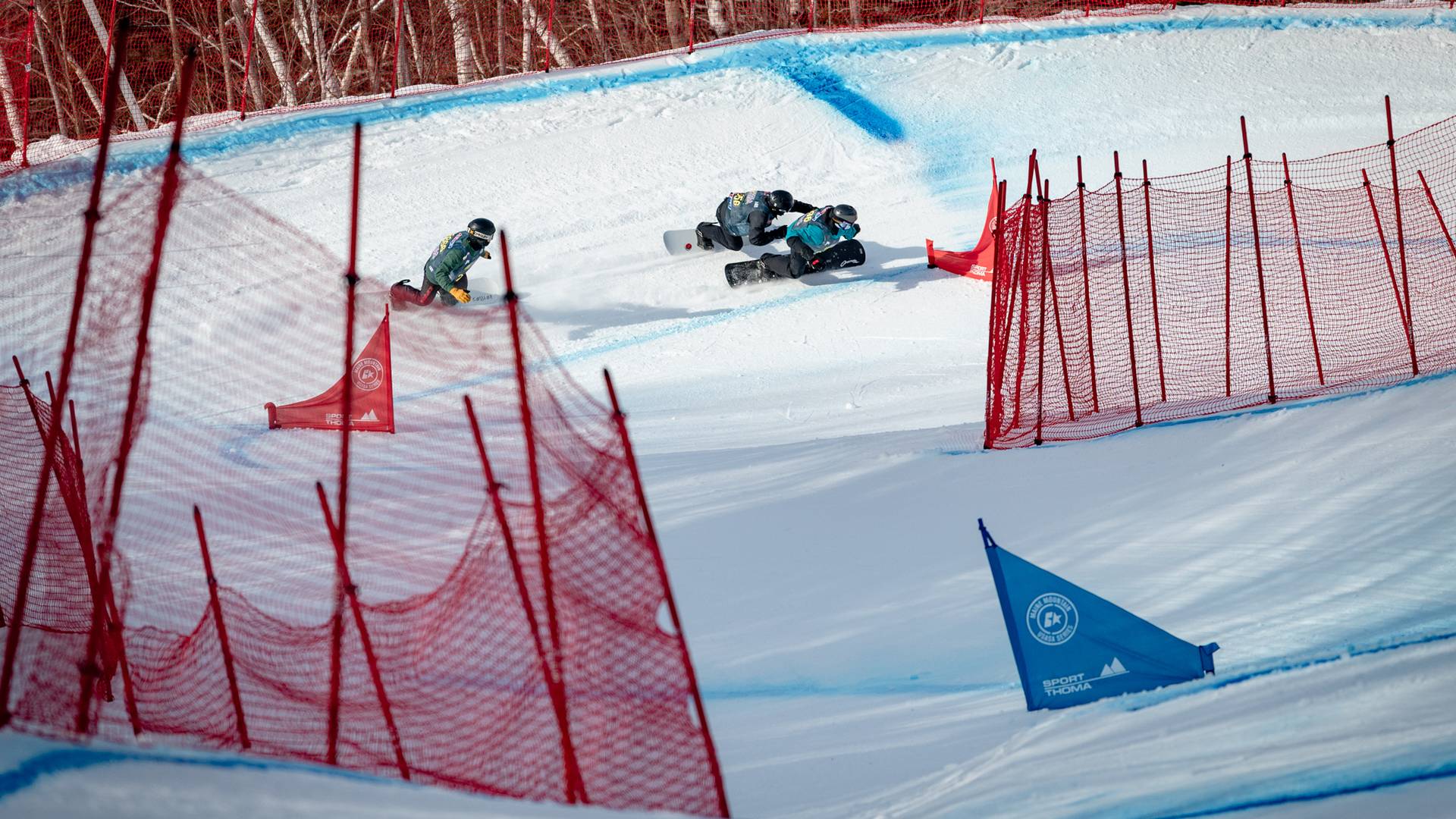Snowboarders competing at Sunday River.