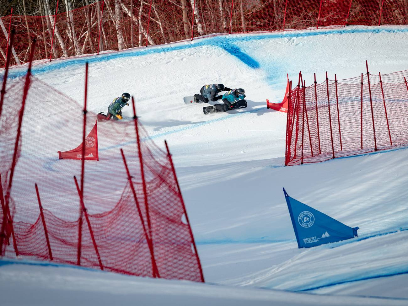 Snowboarders competing at Sunday River.