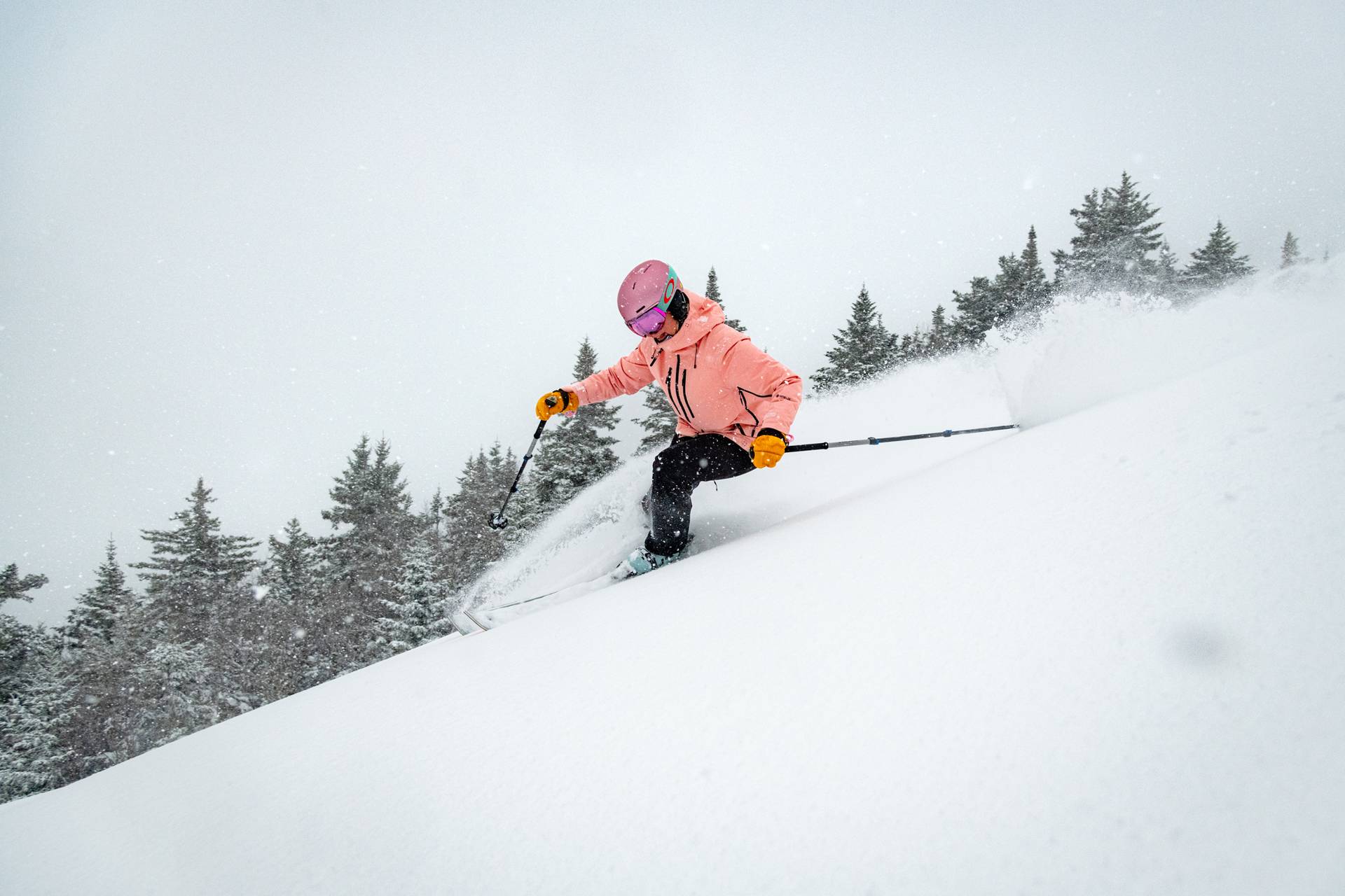 A skier in powder at Sunday River.