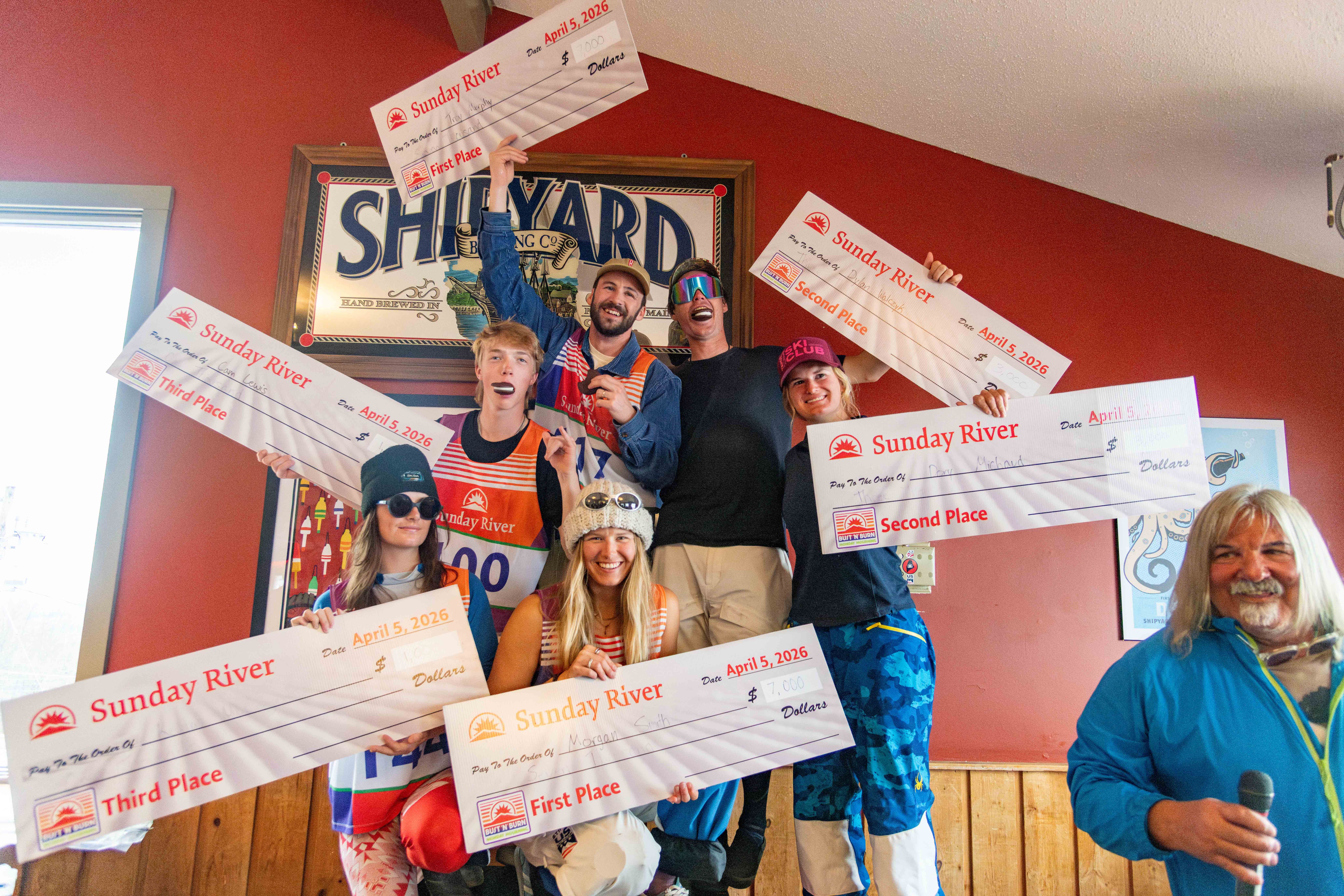 Winners of 2026 BNB posing with their checks.