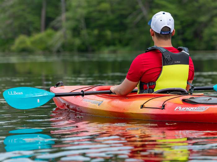A kayaker enjoying Sunday River Outfitters.