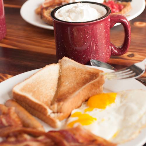 Breakfast at Camp at Sunday River with bacon, eggs, and toast.