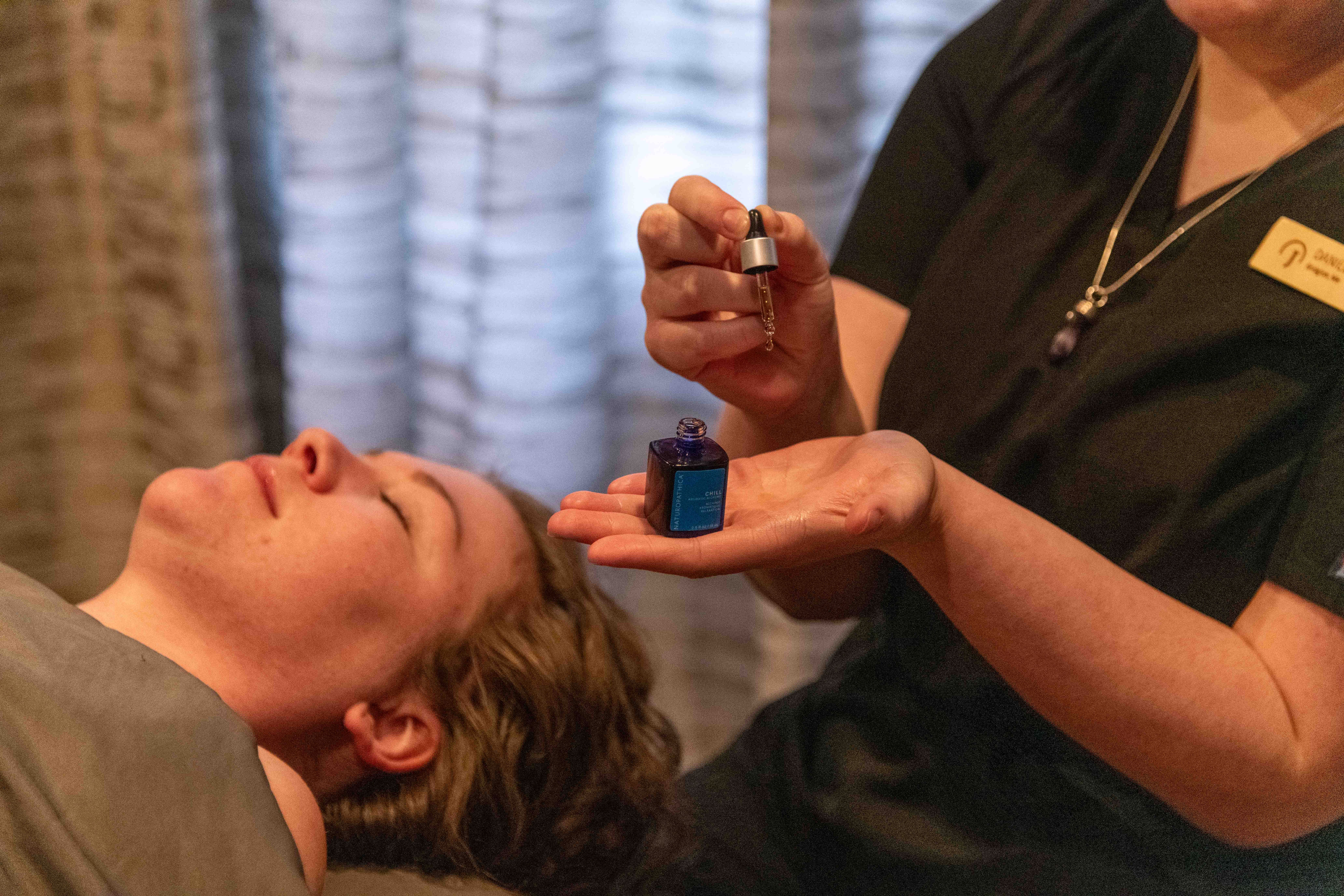 A woman receiving a facial at Sunday River's spa.