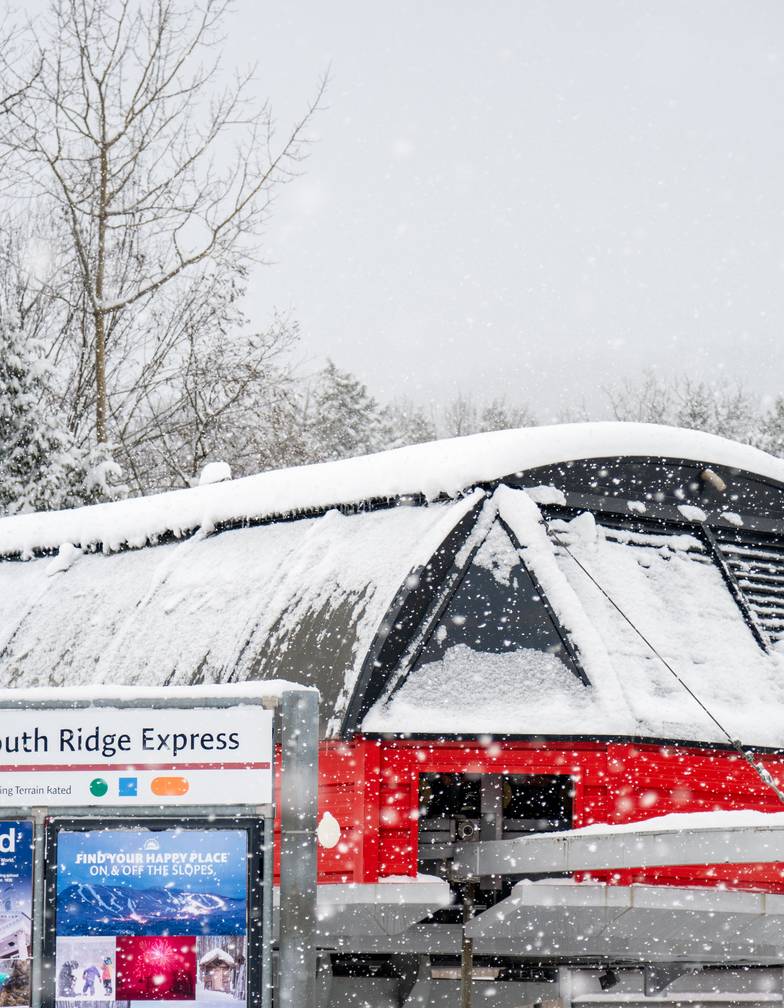 The South Ridge Express lift at Sunday River in the winter.