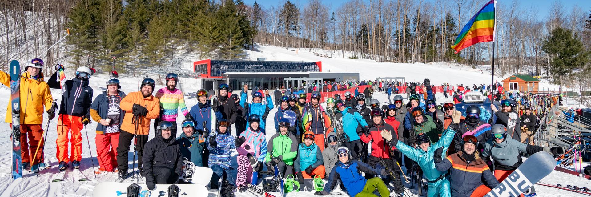 A group of skiers from Outryders posing for a picture at Sunday River.
