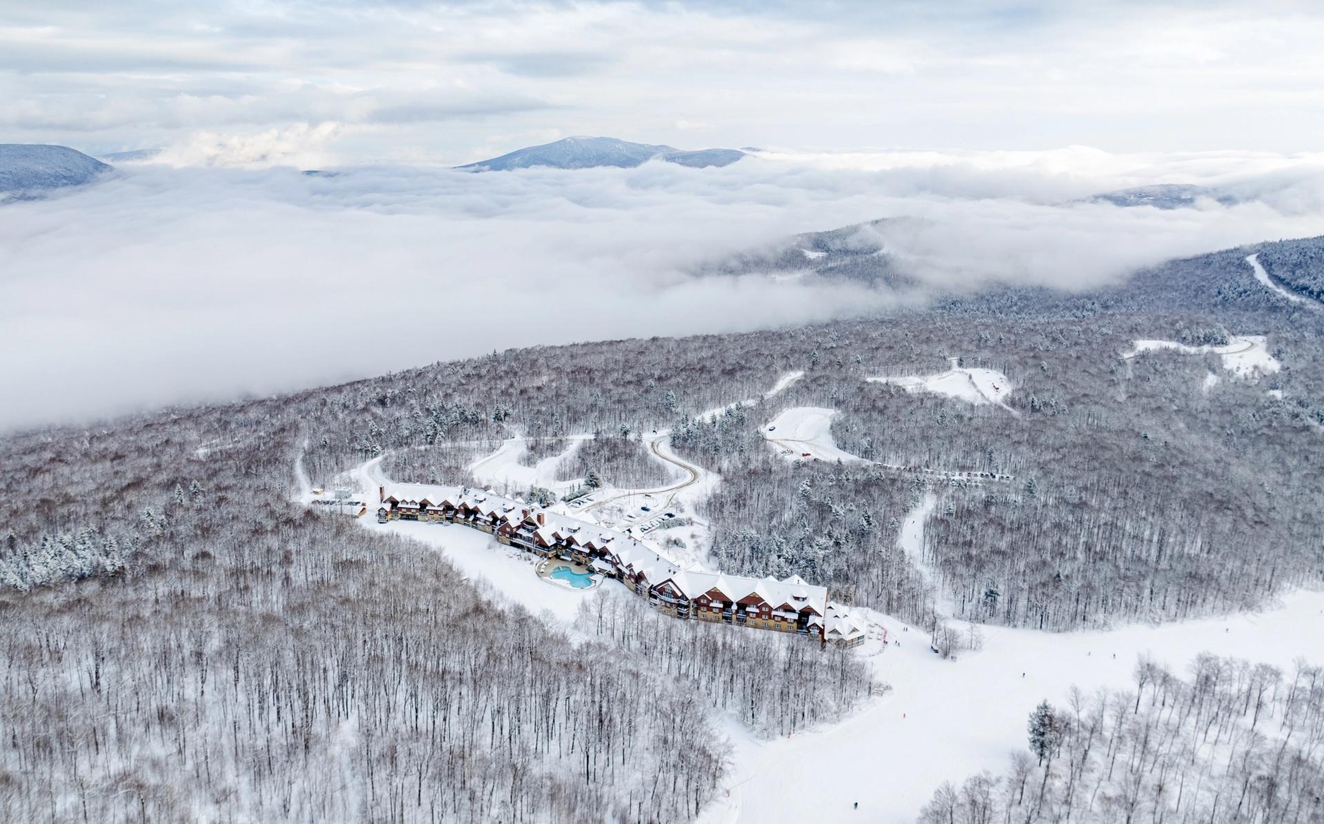 The Jordan with fresh snow and skiers on the trail.