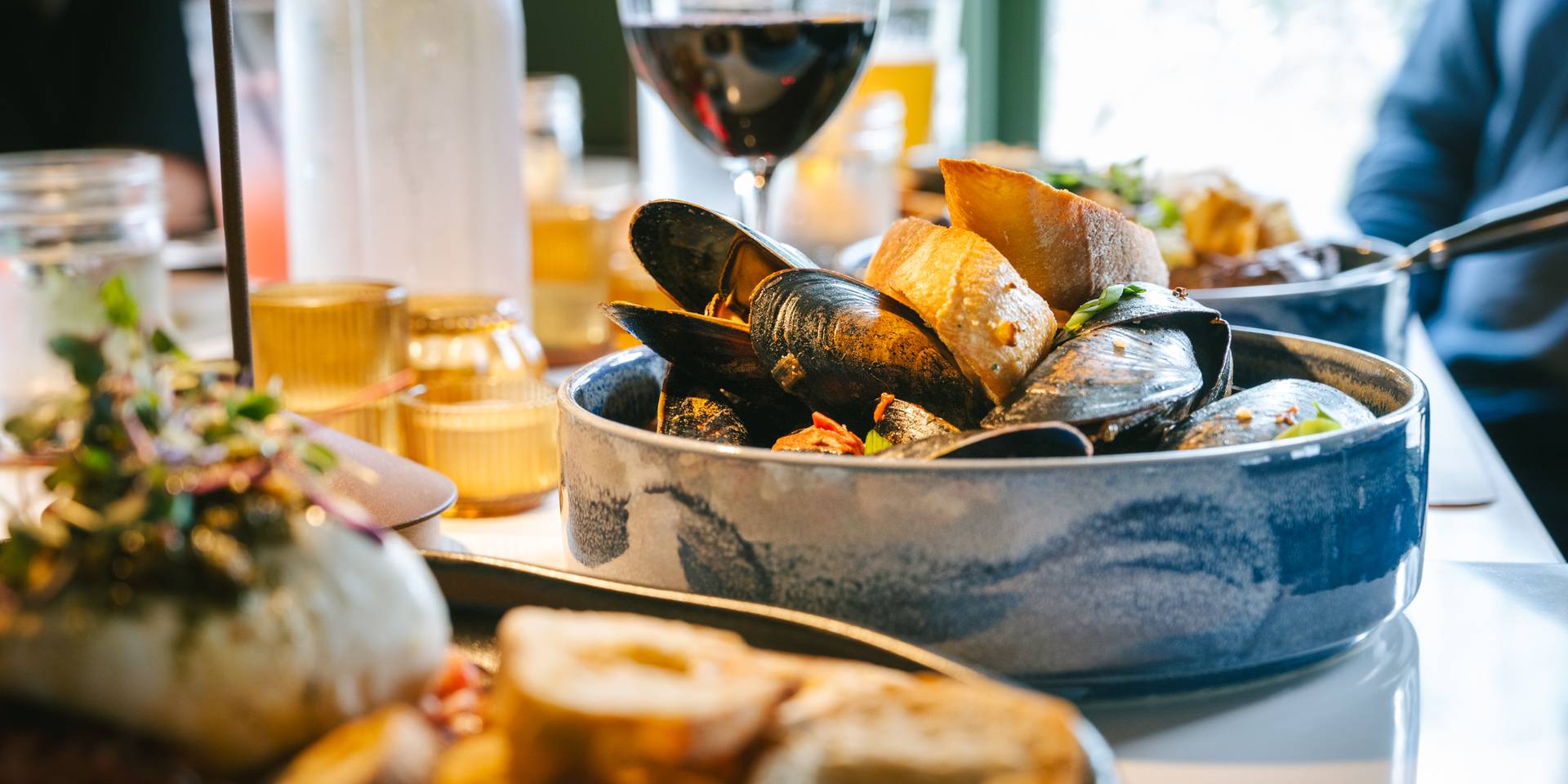 A table full of food at Ember at Sunday River.