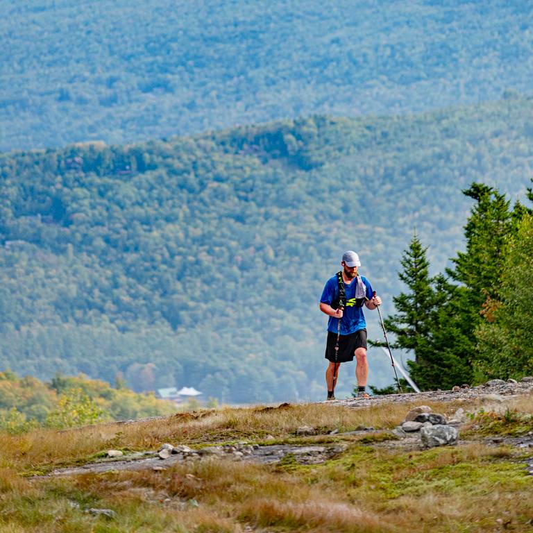 A person hiking at Sunday River.
