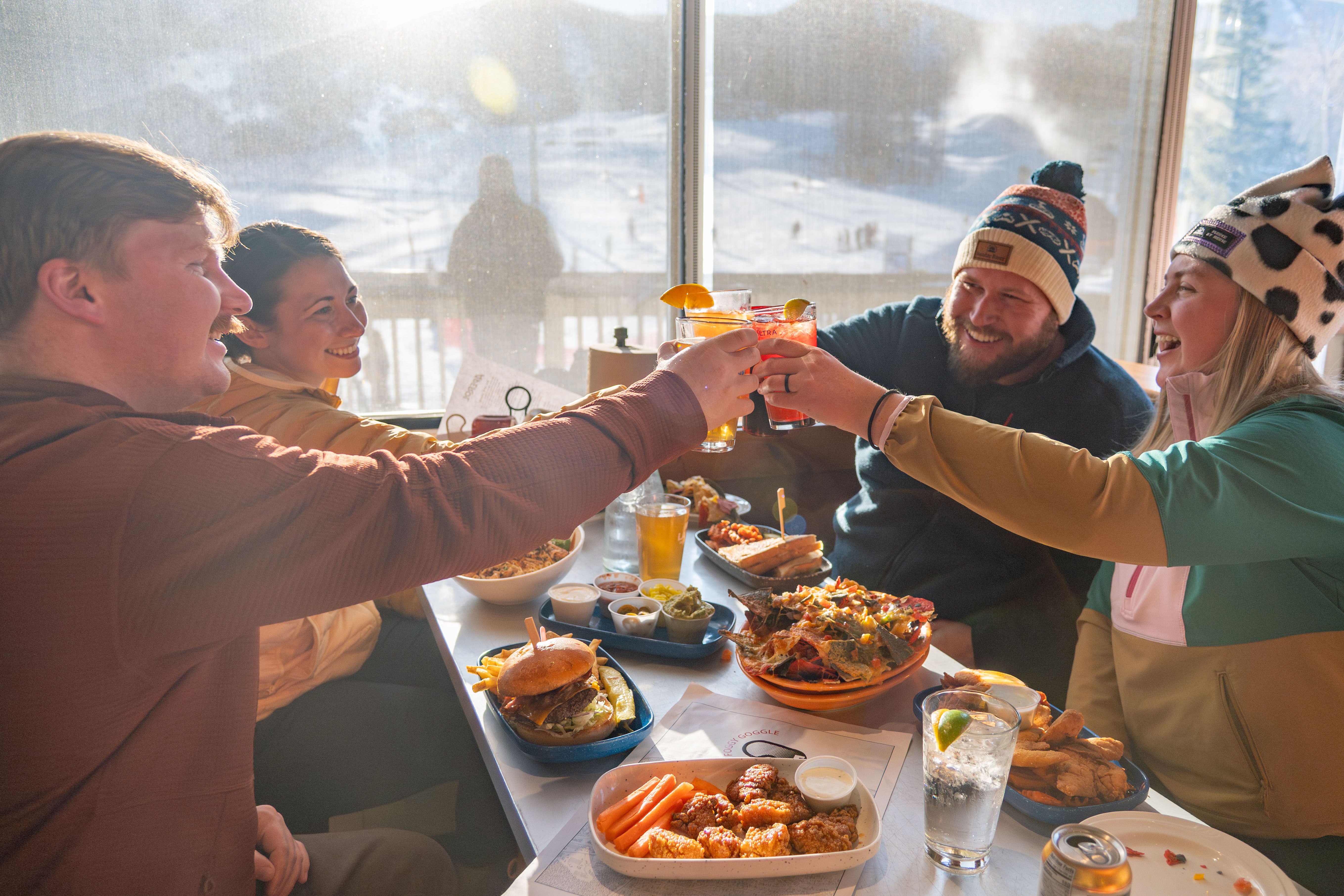 A cheers at the Foggy Goggle at Sunday River, Maine