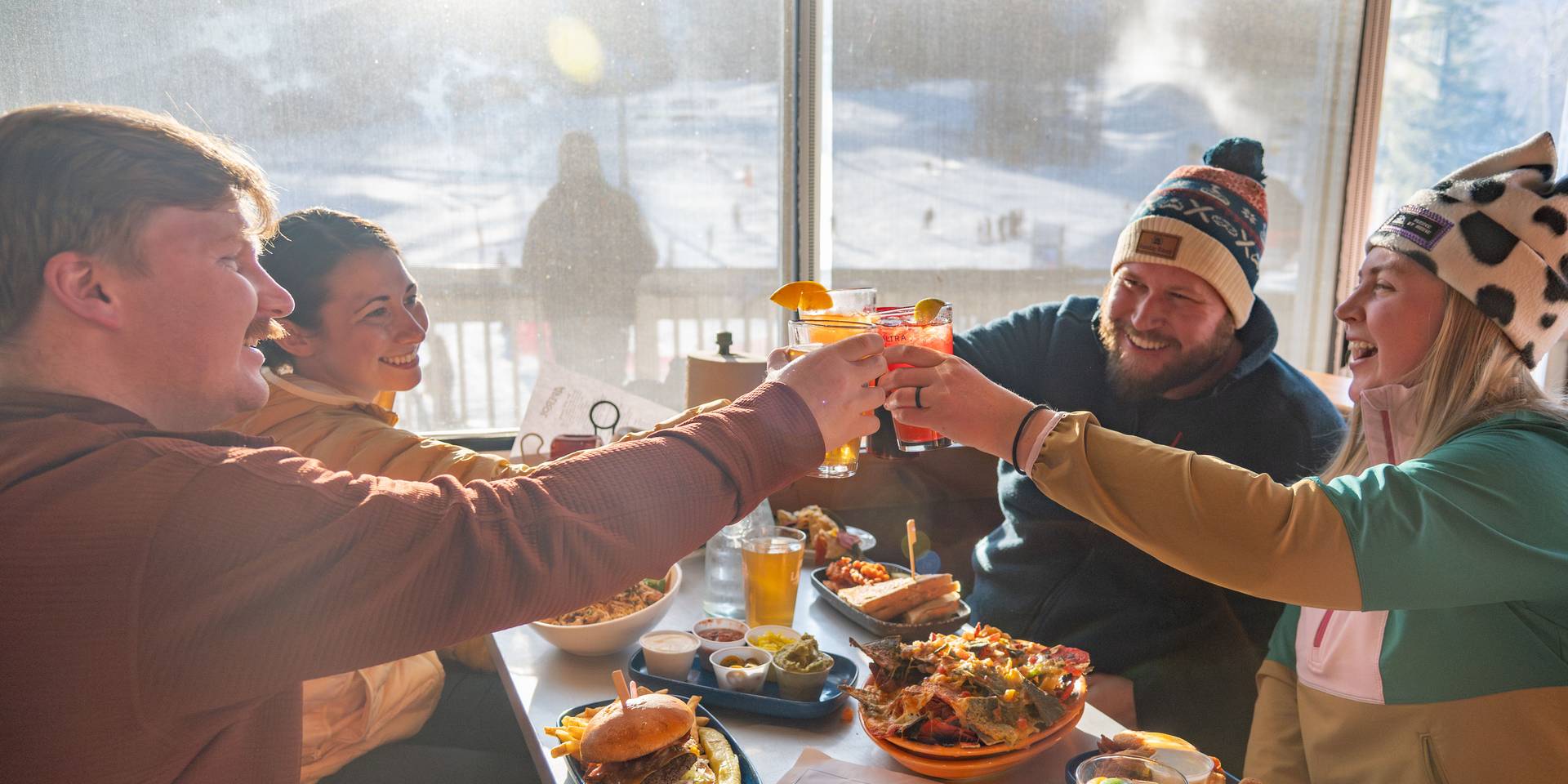 A cheers at the Foggy Goggle at Sunday River, Maine