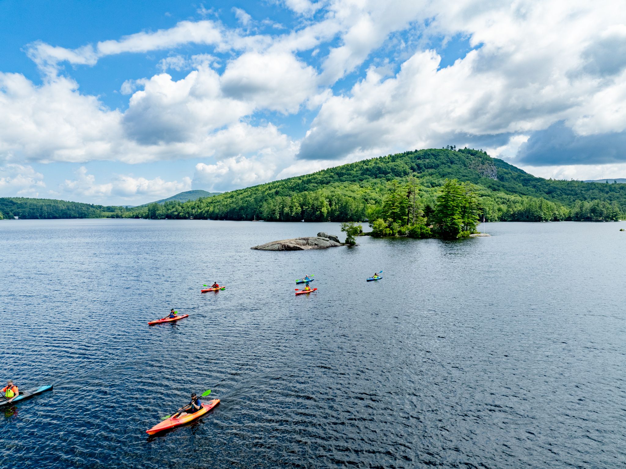 A group of kayakers with Sunday River Outfitters.
