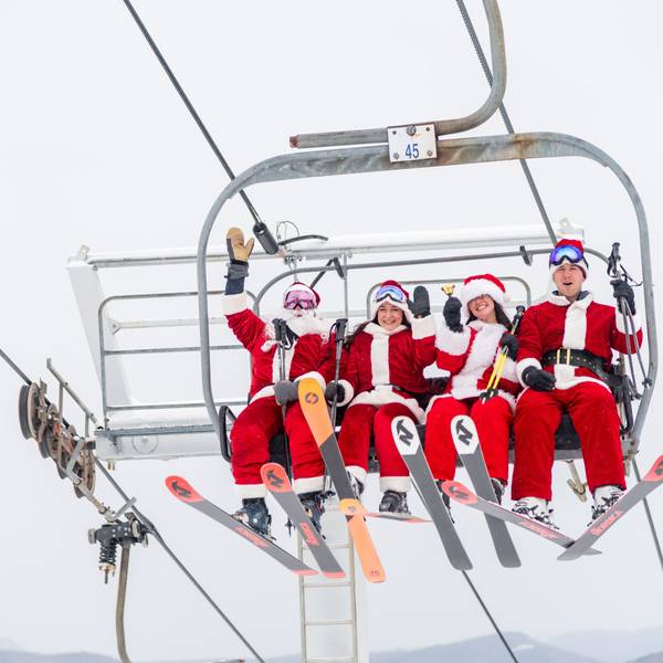 People dressed as Santas for Sunday River's Santa Sunday.