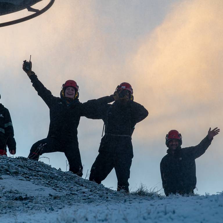 Snowmakers posing for a fun photo at Sunday River.