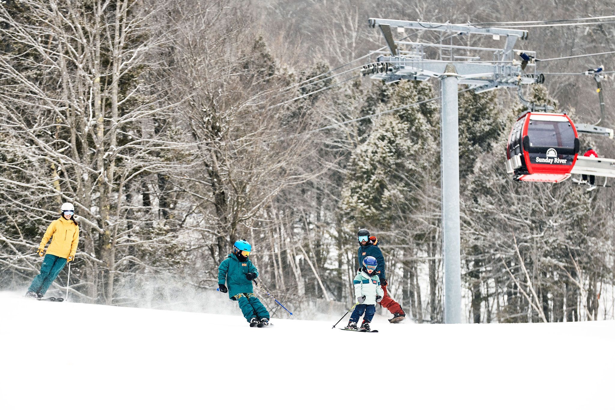 Kids ripping down the slopes at Sunday River.