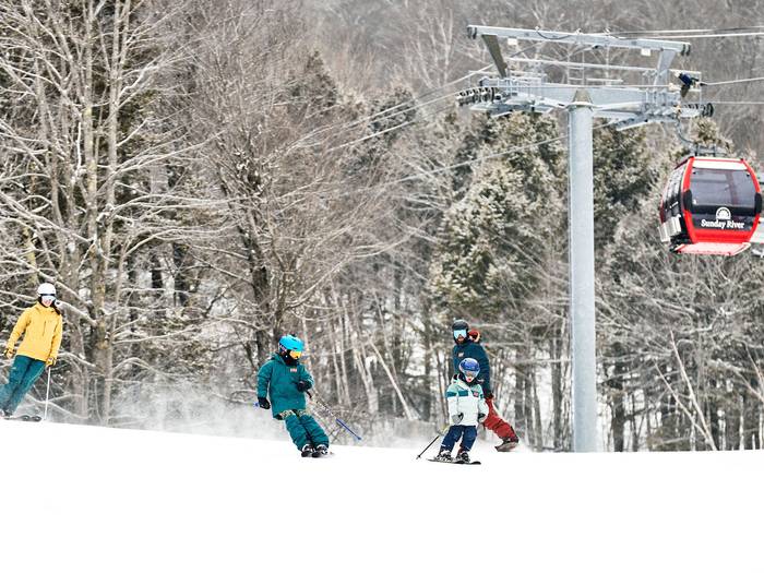 Kids ripping down the slopes at Sunday River.