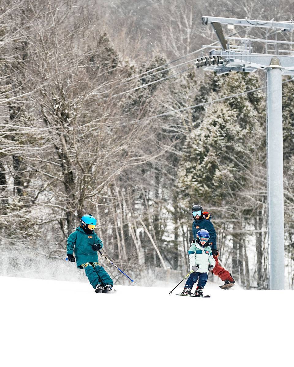 Kids ripping down the slopes at Sunday River.