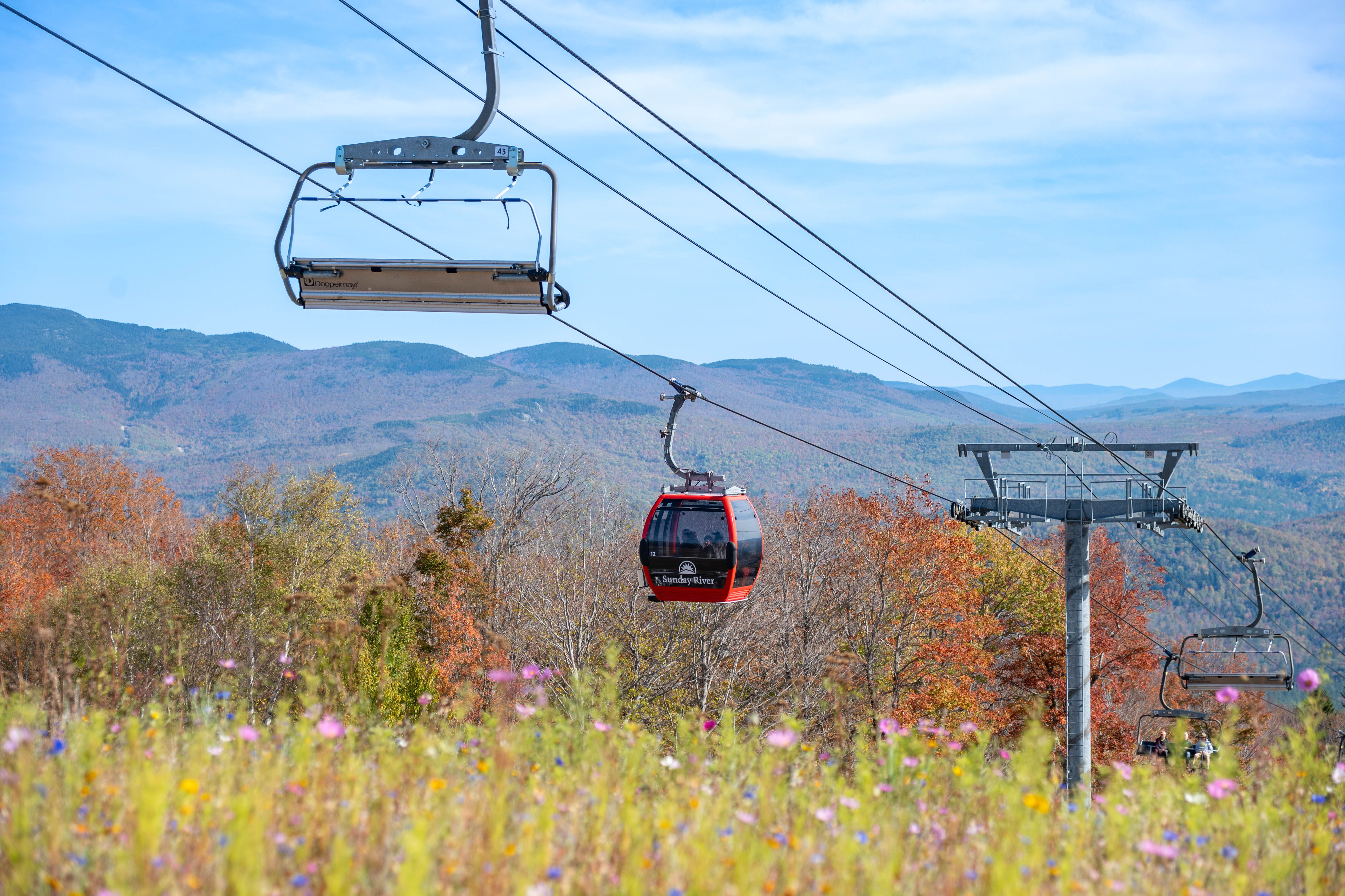 Fall foliage with the Chondola in the background.