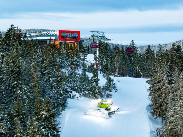 A groomer out in the morning at Sunday River Resort.