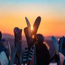 Skis on the rack at sunrise.