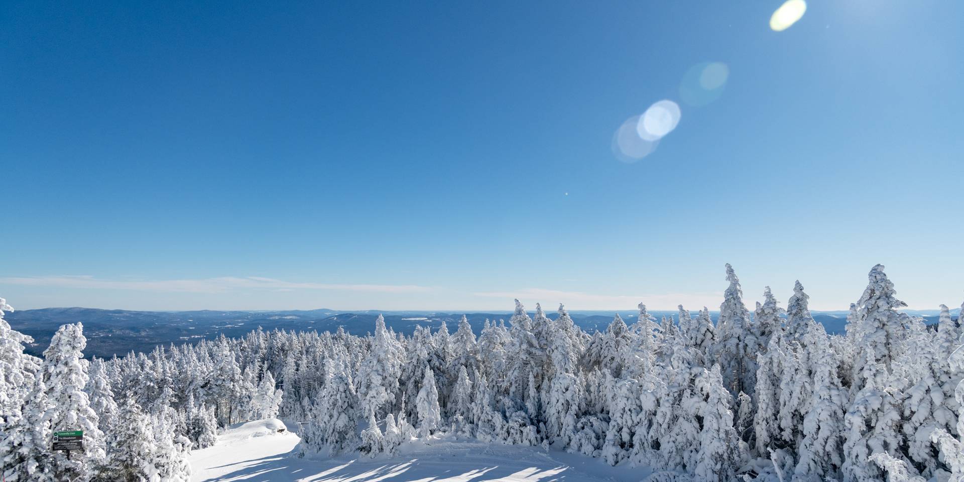 A trail covered in snow at Sunday River.