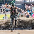 A woman flying into the water at Sunday River's Tough Mountain Challenge.