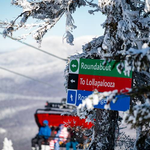 Trail sign in Jordan at Sunday River in the winter.