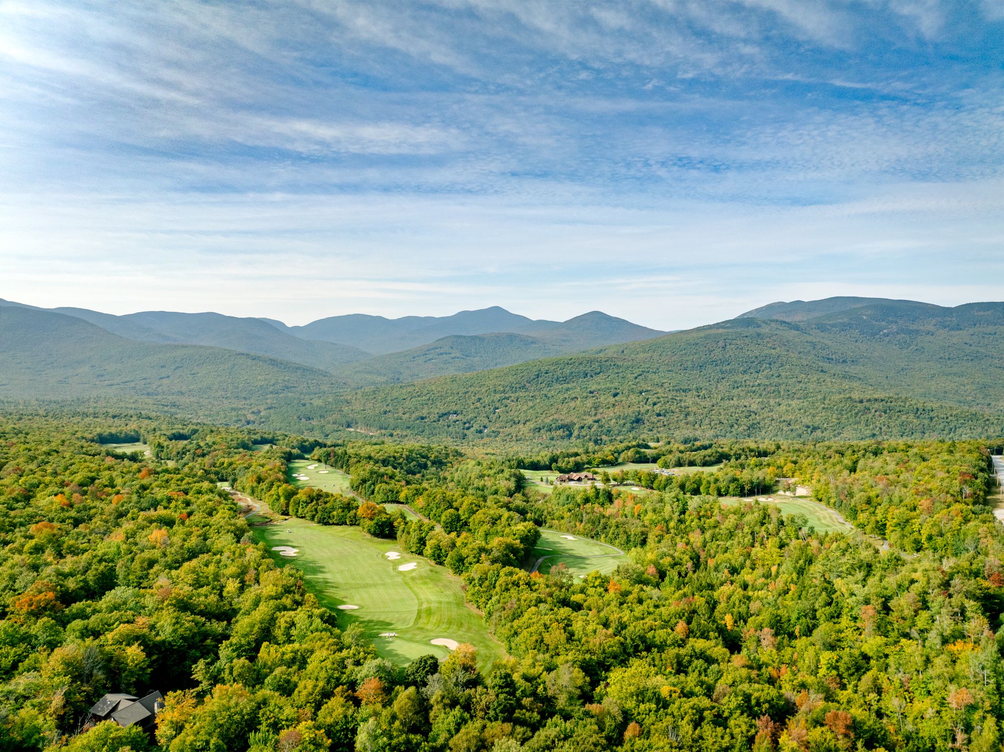 Aerial view of the Mahoosucs and the Sunday River Golf Club.