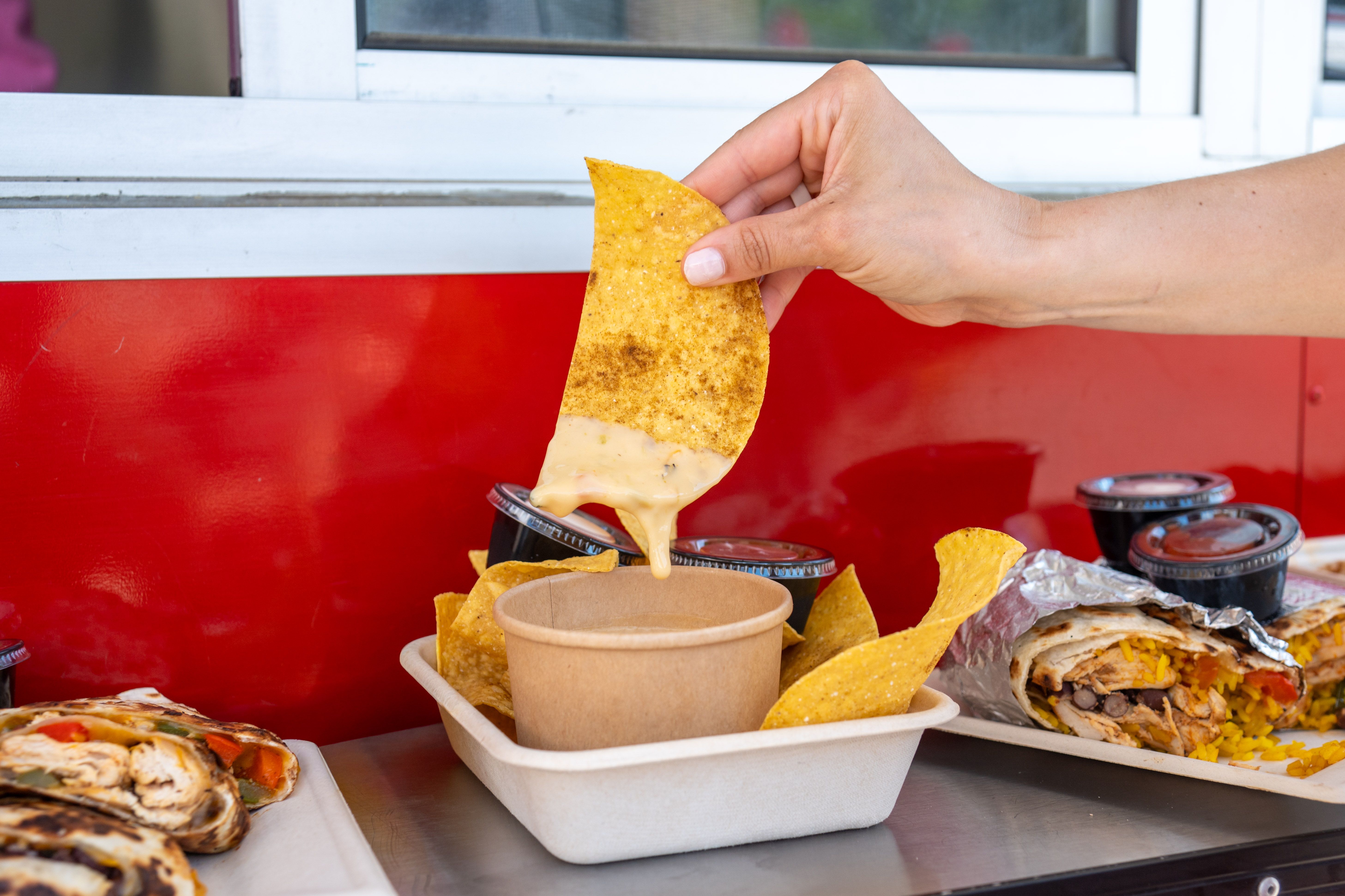 Cheese pull from some queso.