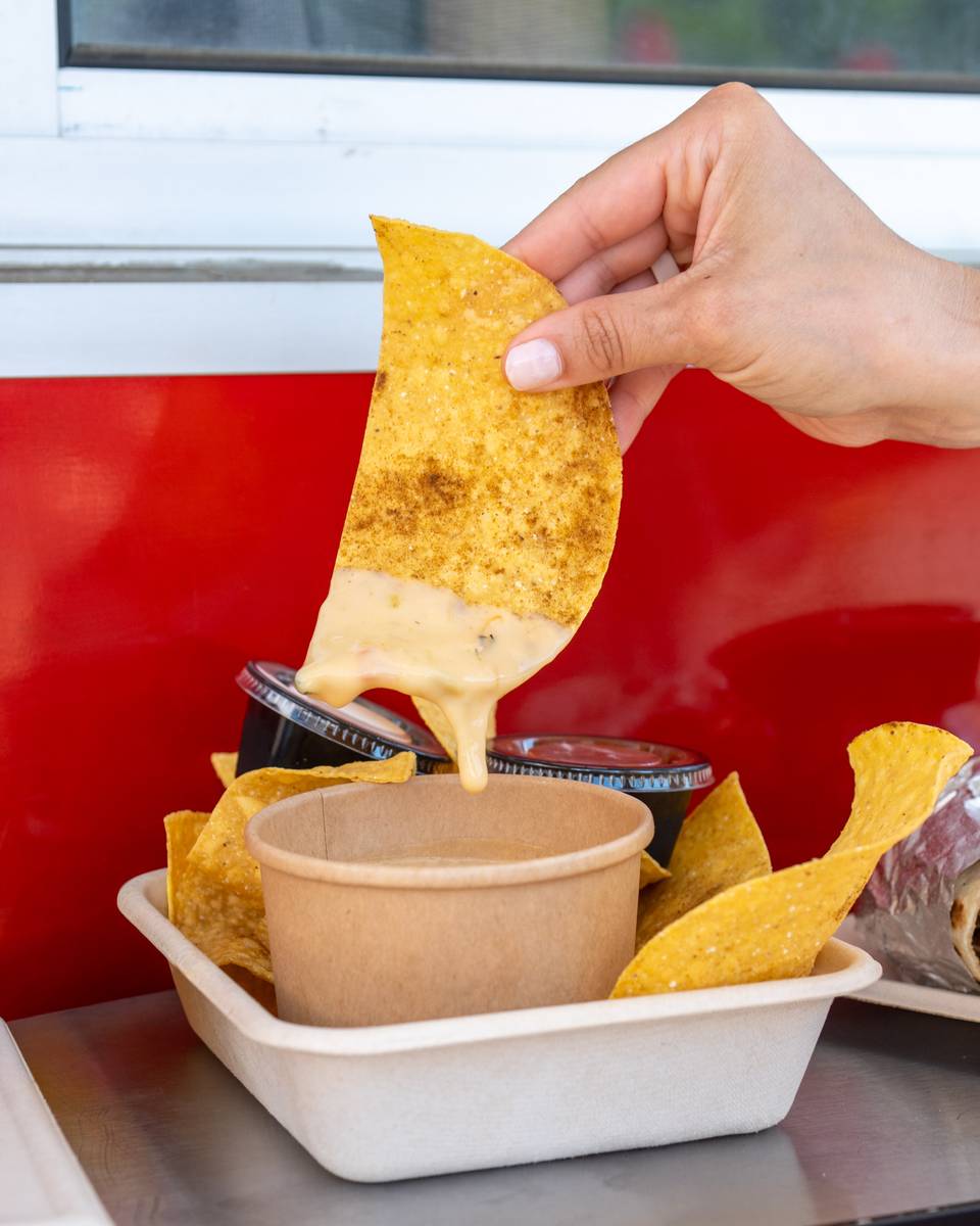Cheese pull from some queso.