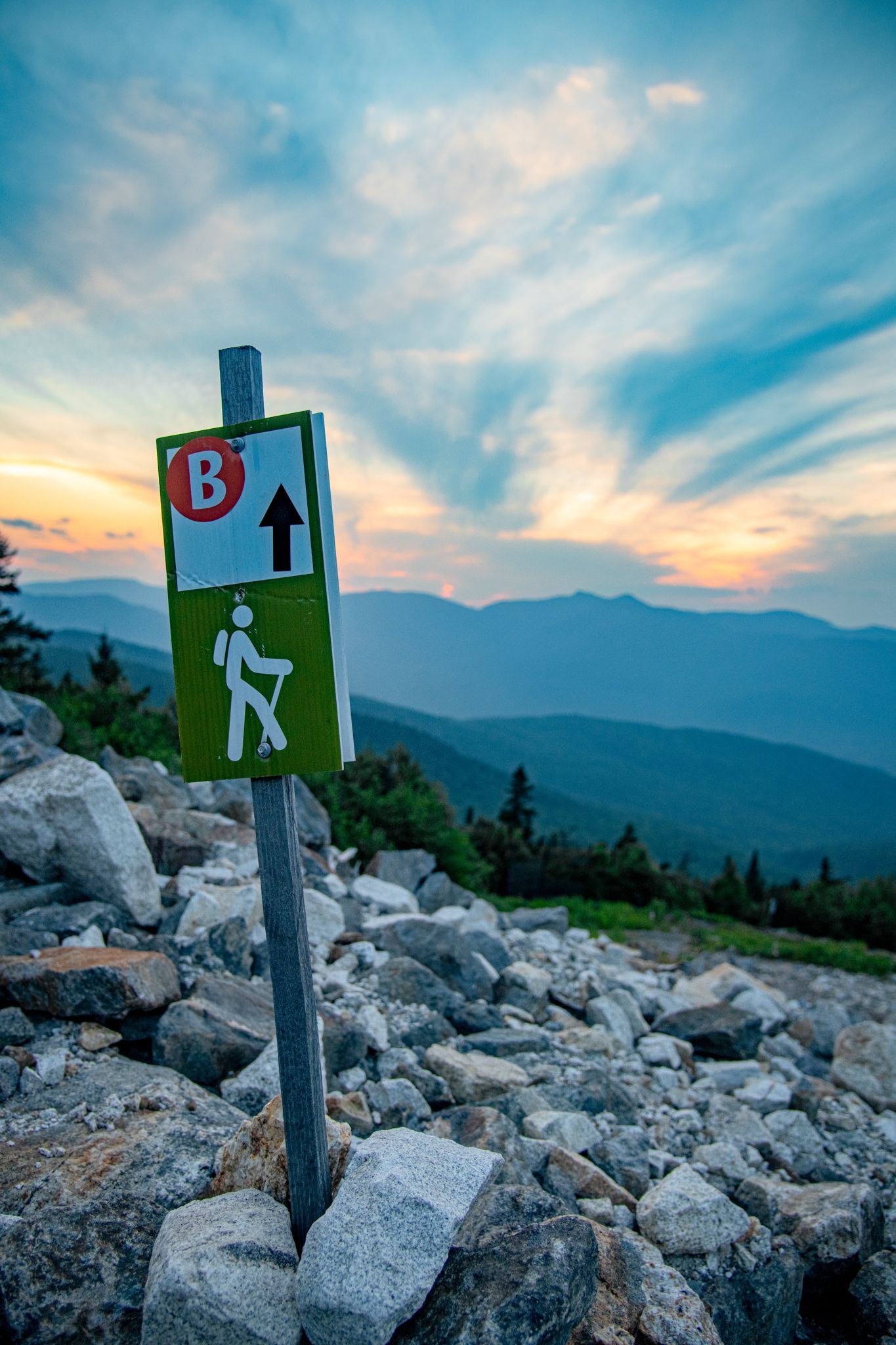 A trail sign at Sunday River for hiking trails in the summer.