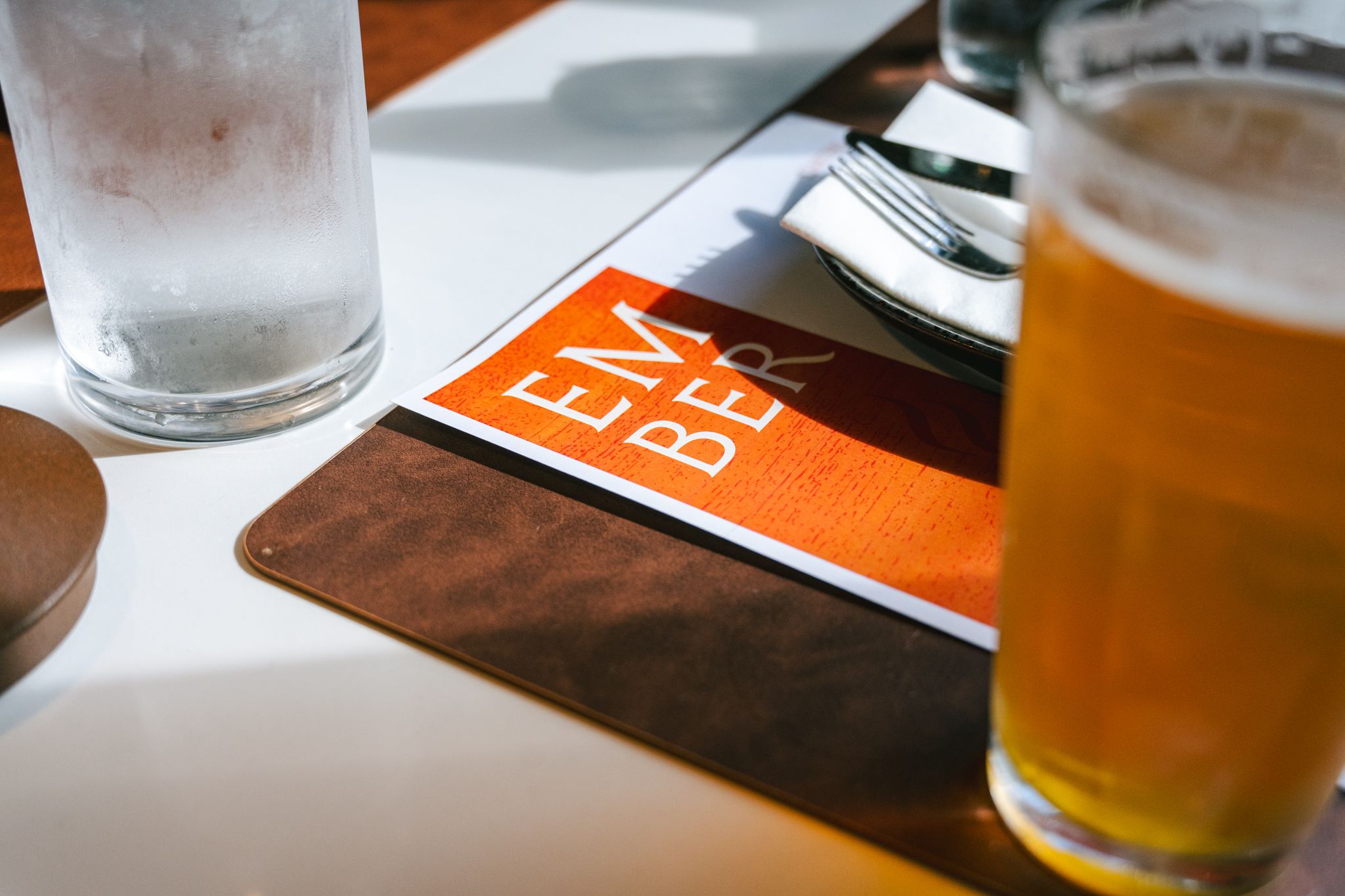 A dinner menu and drinks at Ember.