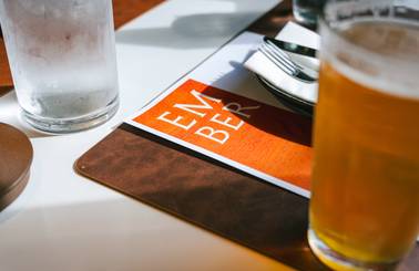 A dinner menu and drinks at Ember.