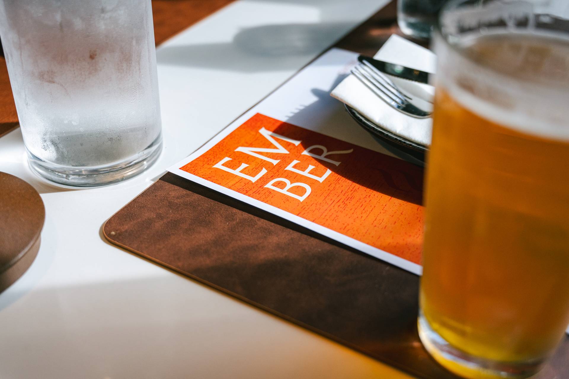 A dinner menu and drinks at Ember.