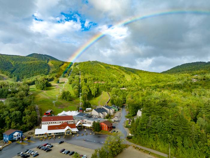 A rainbow over South Ridge Lodge at Sunday River Resort