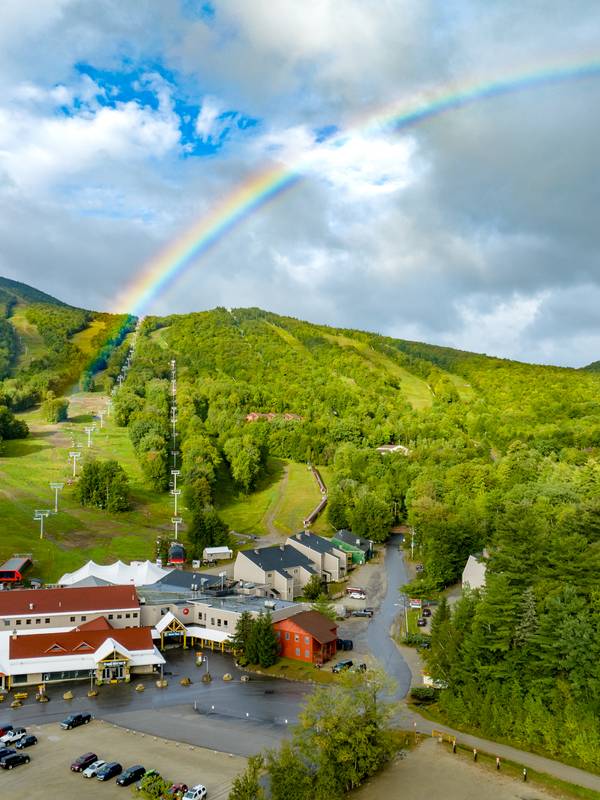 A rainbow over South Ridge Lodge at Sunday River Resort