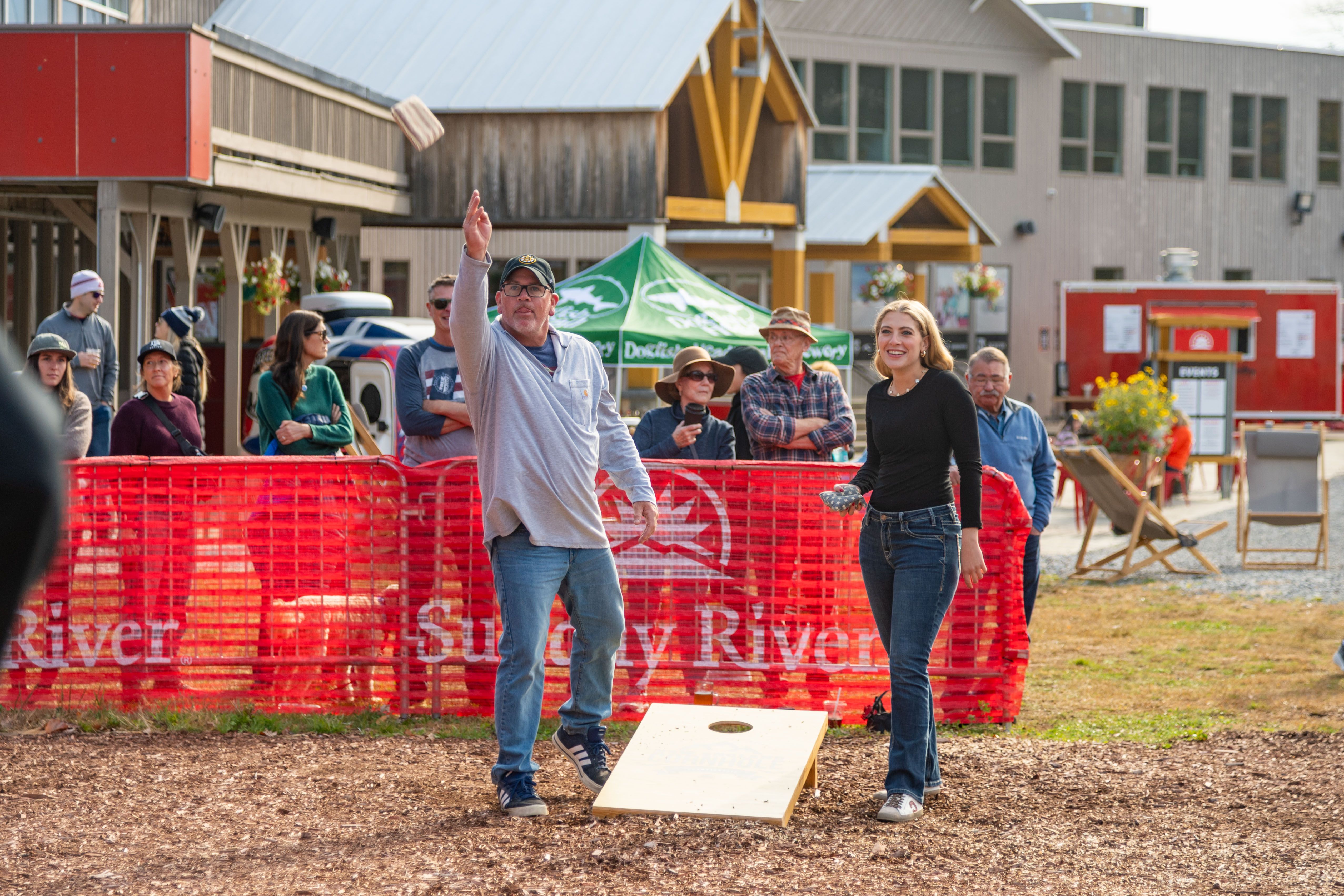 People playing cornhole at Sunday River.