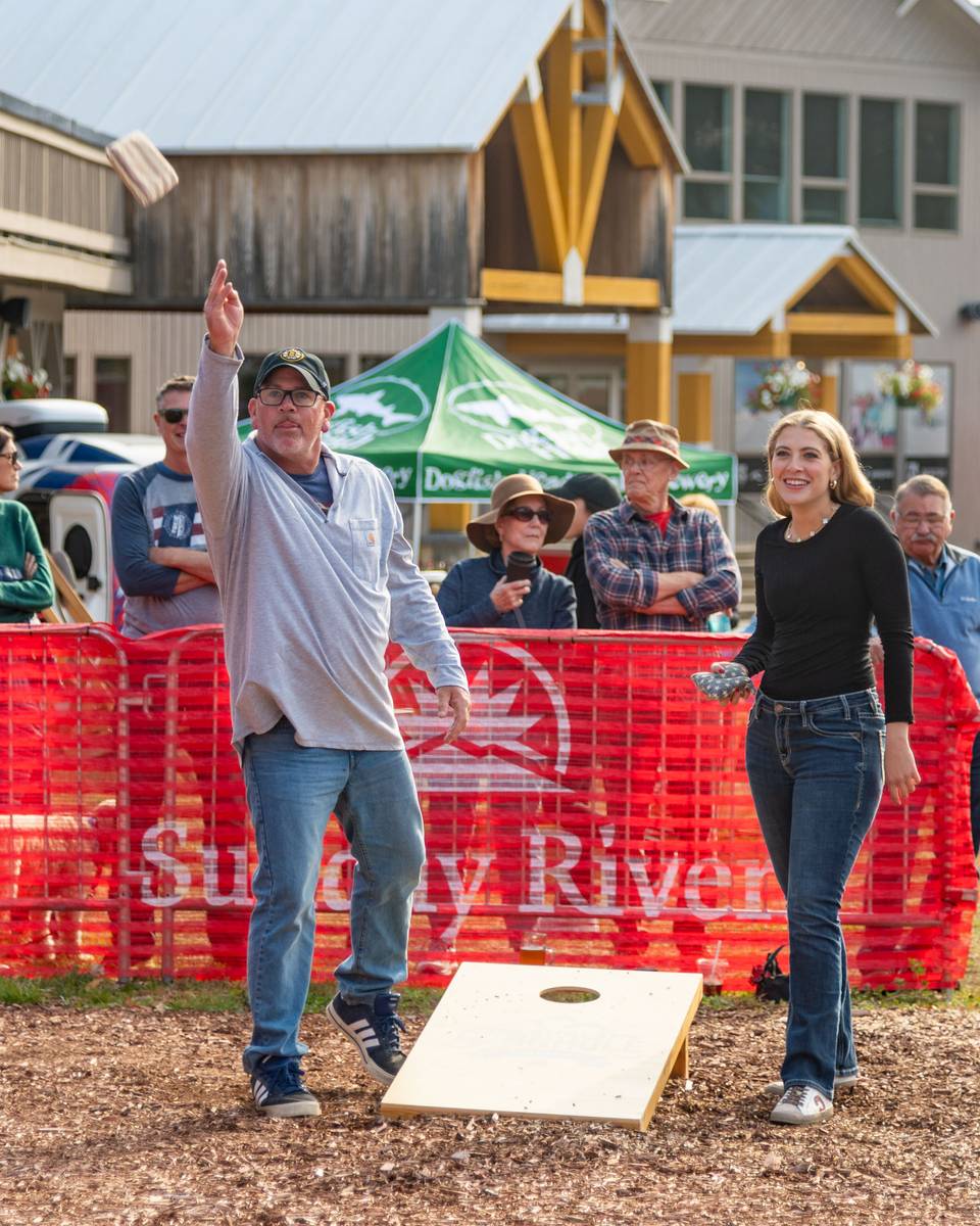 People playing cornhole at Sunday River.