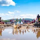 Kids jumping in the mud at the Mini Mountain Challenge at Sunday River.
