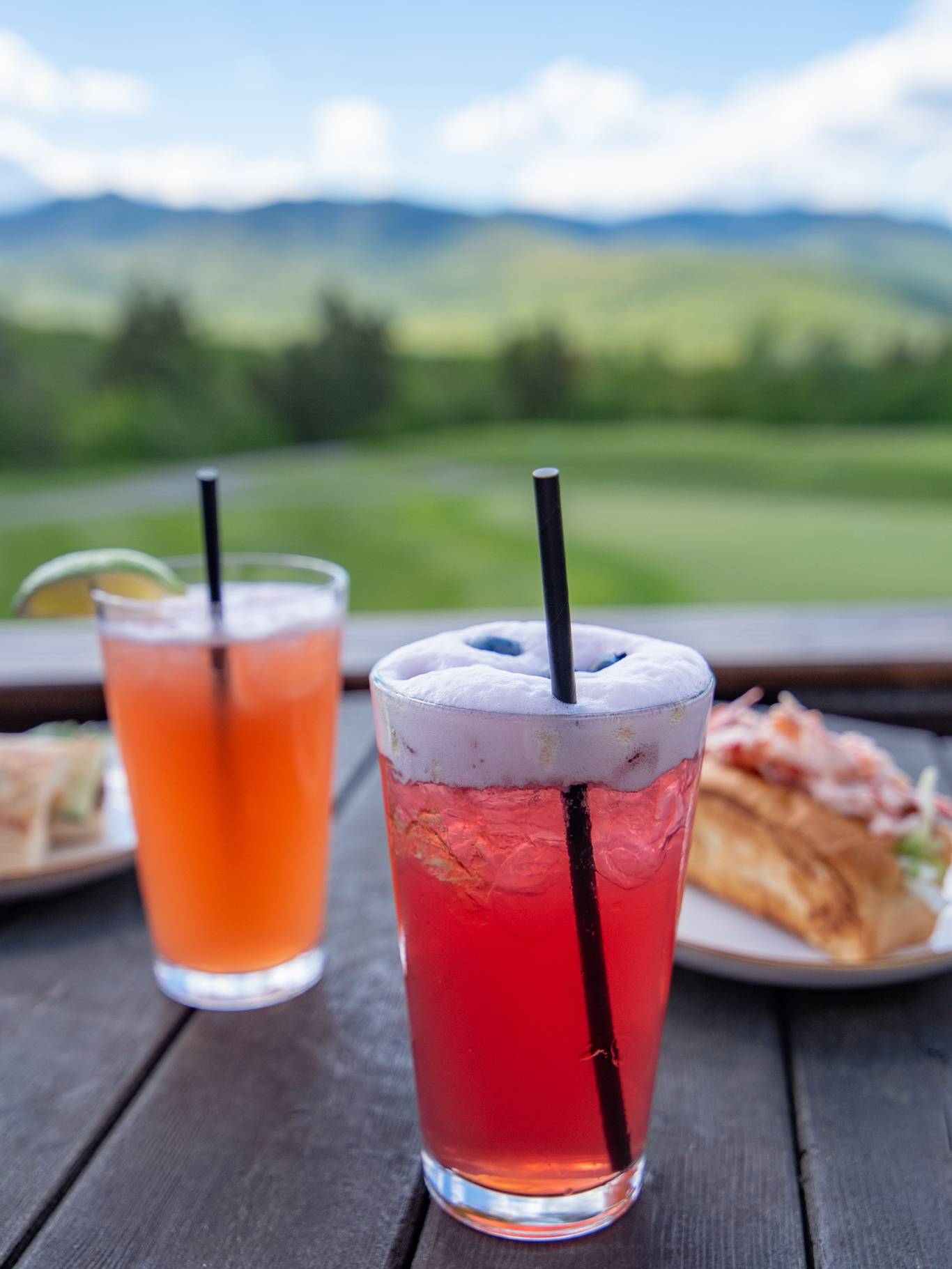 Drinks and food on a table at the Clubhouse.