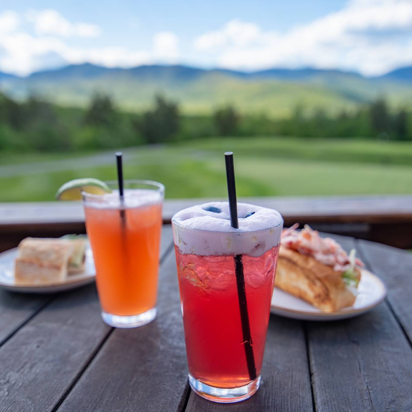 Drinks and food on a table at the Clubhouse.
