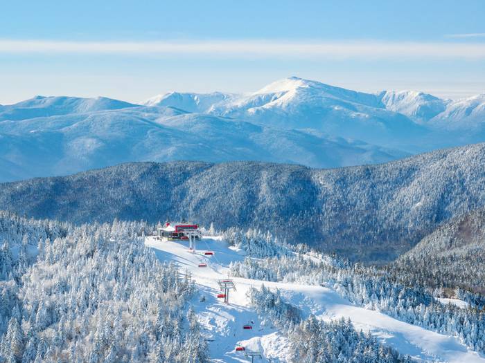 The Jordan 8 with mountains in the background in the winter at Sunday River.