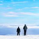 Skiers looking at the undercast at Sunday River.