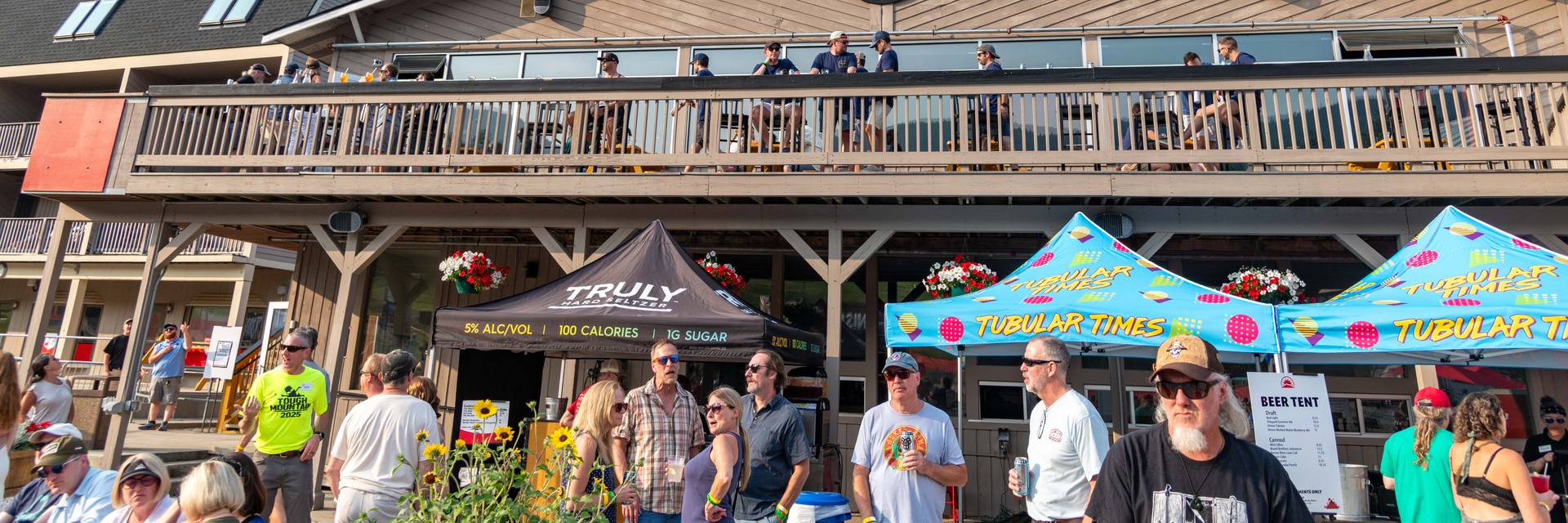 People standing outside during the live music section of Tough Mountain Challenge.