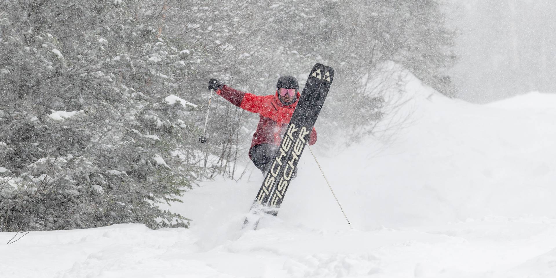 A skier in powder at Sunday River, Maine