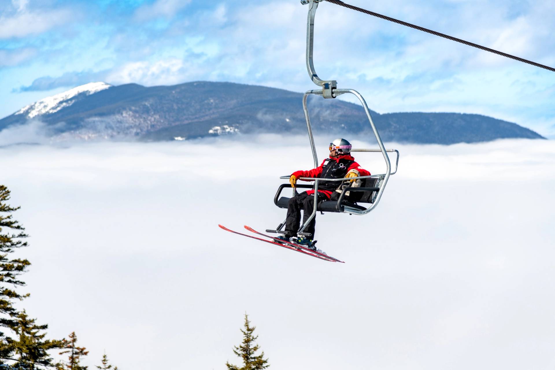 Ski patrol riding the Spruce chair.