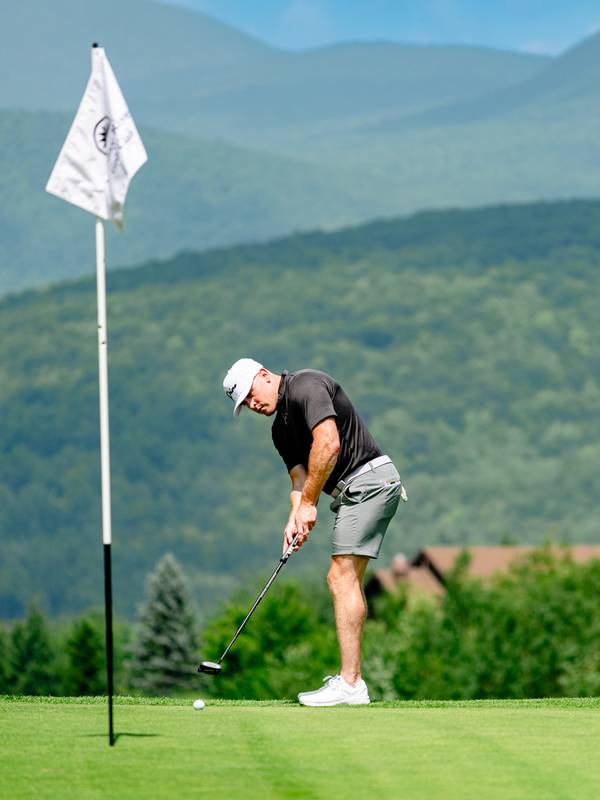 A golfer at the Sunday River Golf Course