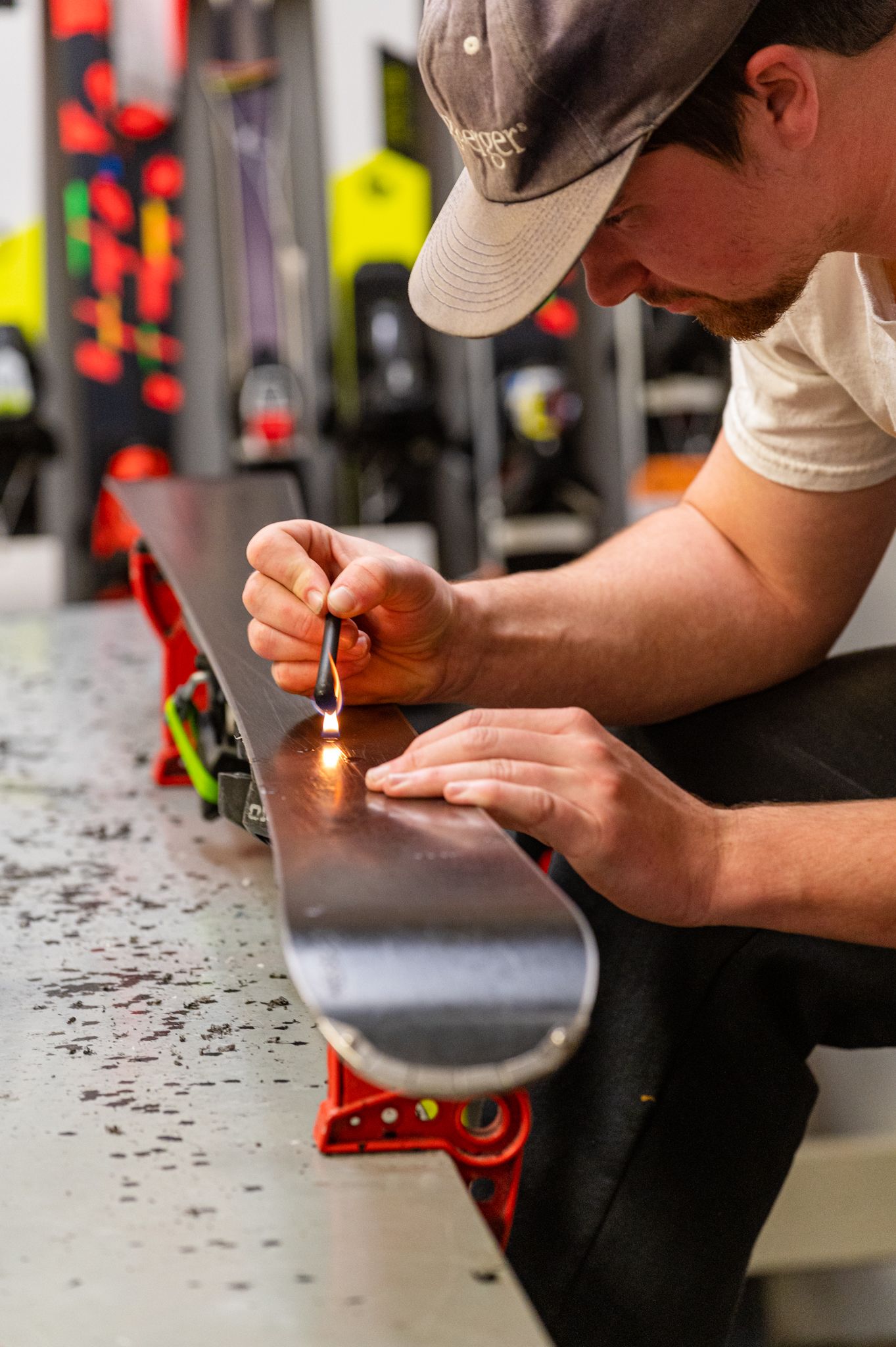 A guy repairing skis at Sunday River.
