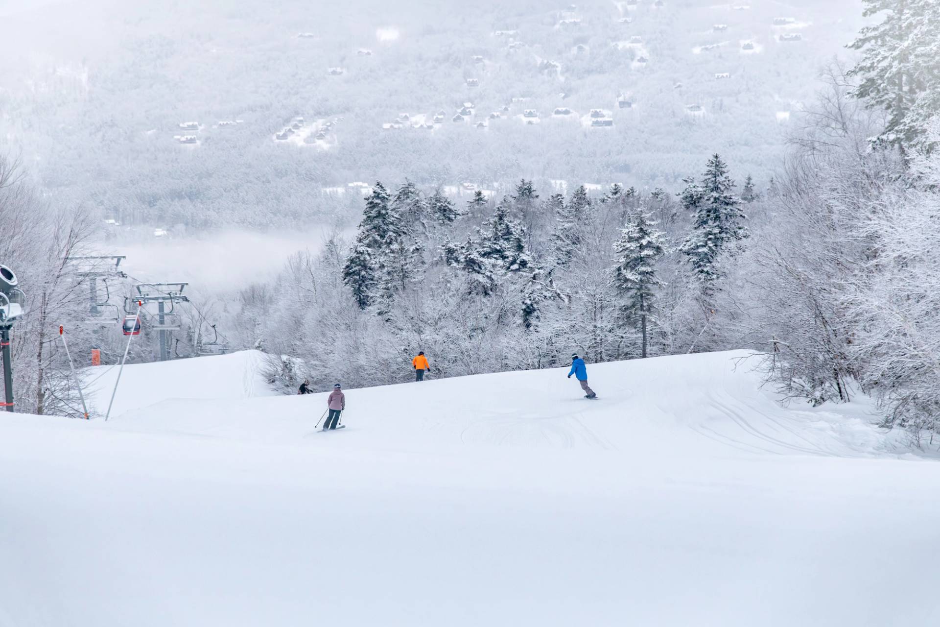 Skiers at Sunday River participating in first tracks.